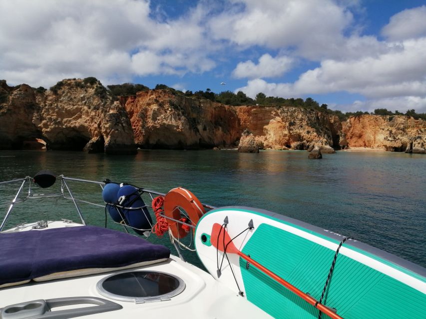 Lagos: Luxury Yacht Charter with Drinks & Tapas - Swimming, snorkeling, kayaking, and the tender