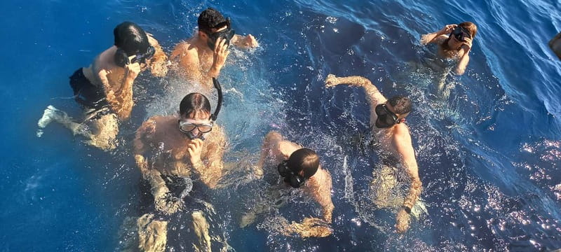 Larnaca: Yellow Submarine Swim Cruise with Unlimited Drinks - The ride back past Finikoudes Beach