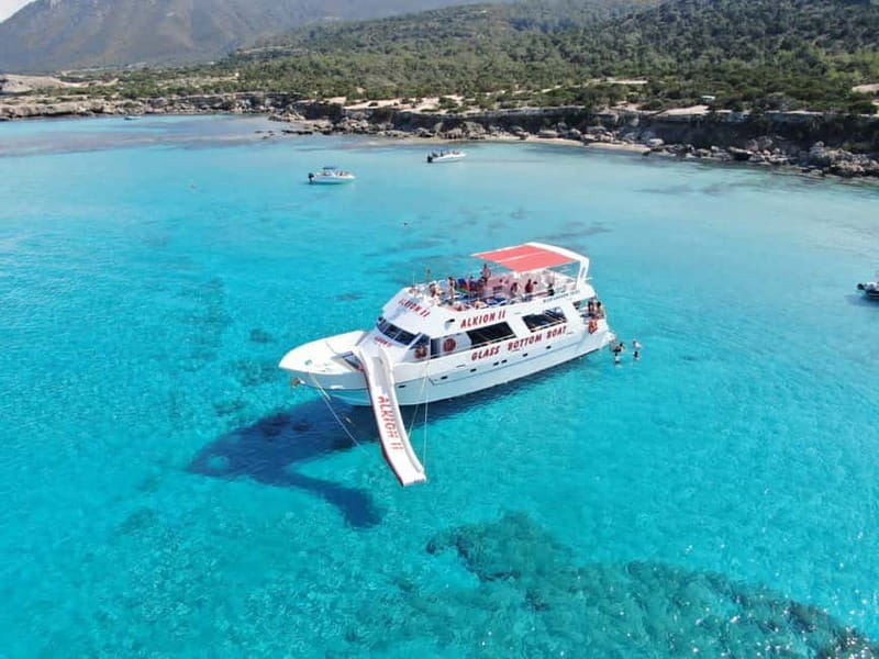 Latchi: Blue Lagoon Glass Bottom Boat Cruise with Drinks - Finding Alkion II at Latchi harbor