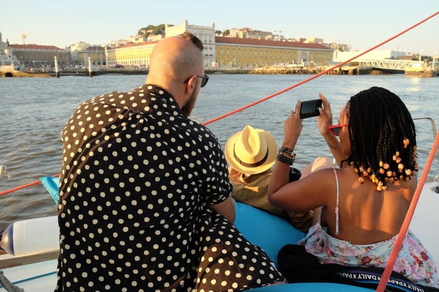 Lisbon: City Skyline Sailboat Cruise with Drink and Snacks - Sailing under the 25 de Abril Bridge