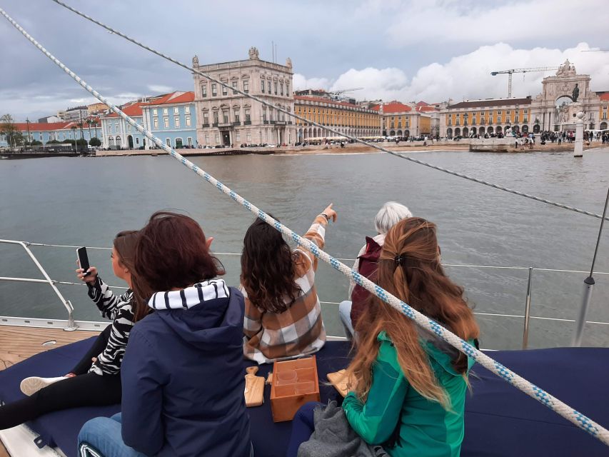 Lisbon: City Skyline Sailboat Cruise with Drink and Snacks - Drinks, snacks, and the social side