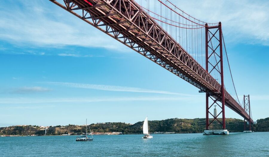 Lisbon: City Skyline Sailboat Cruise with Drink and Snacks - From Santo Amaro to Praça do Comércio