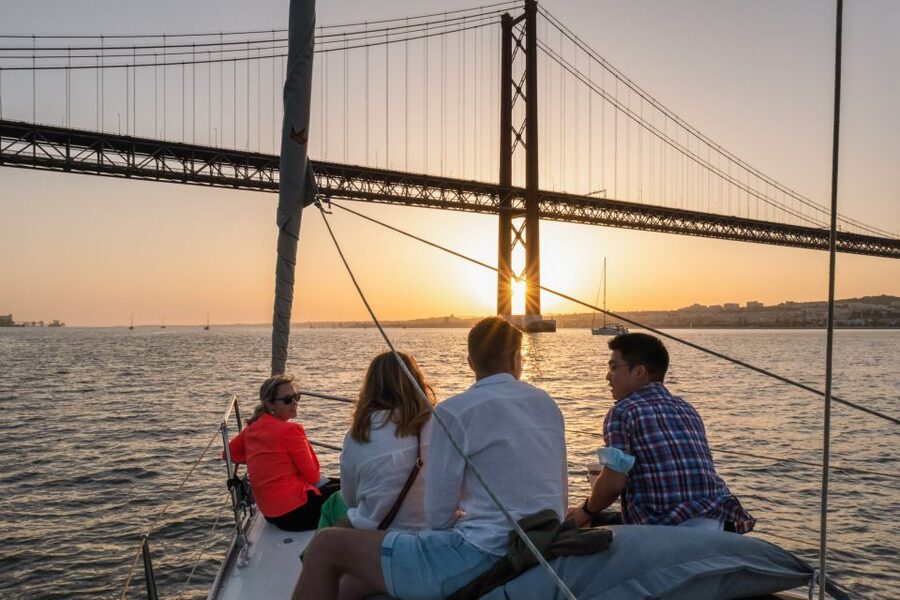 Lisbon: Daytime/Sunset/Night City Sailboat Tour with Drink - What the welcome drink adds to the trip