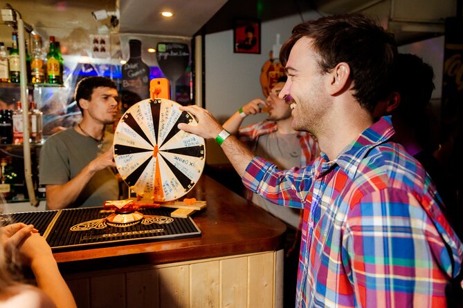 Lisbon: Pub Crawl with Open Bar, Shots & VIP Club Entry - Pink Street and the middle of the night