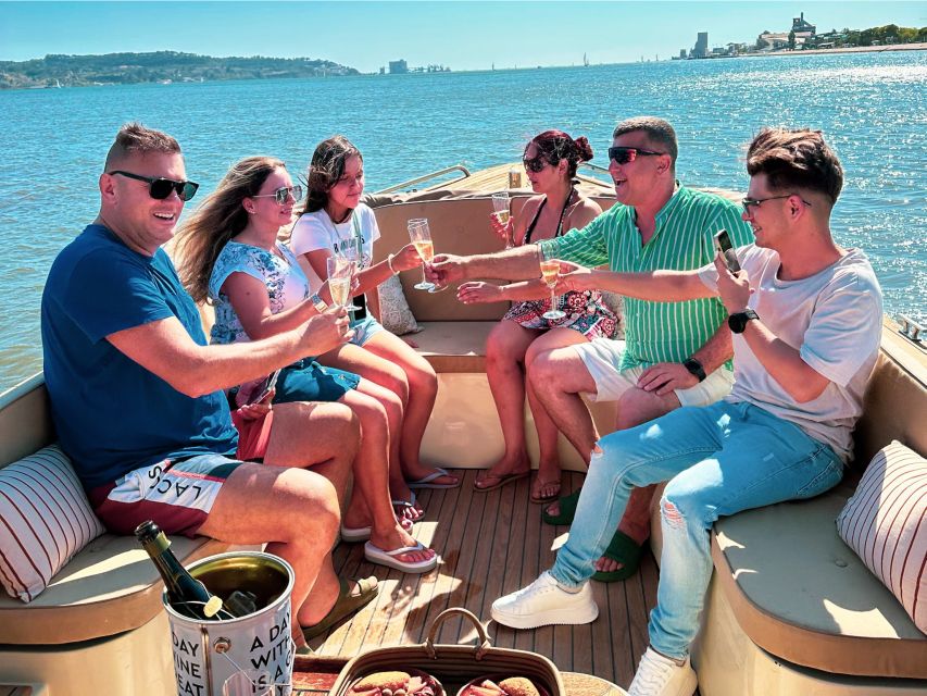Lisbon: Relax in the Waves - Open Bar and Snacks at Sunset - The modern waterfront near MAAT and the Tejo Power Station