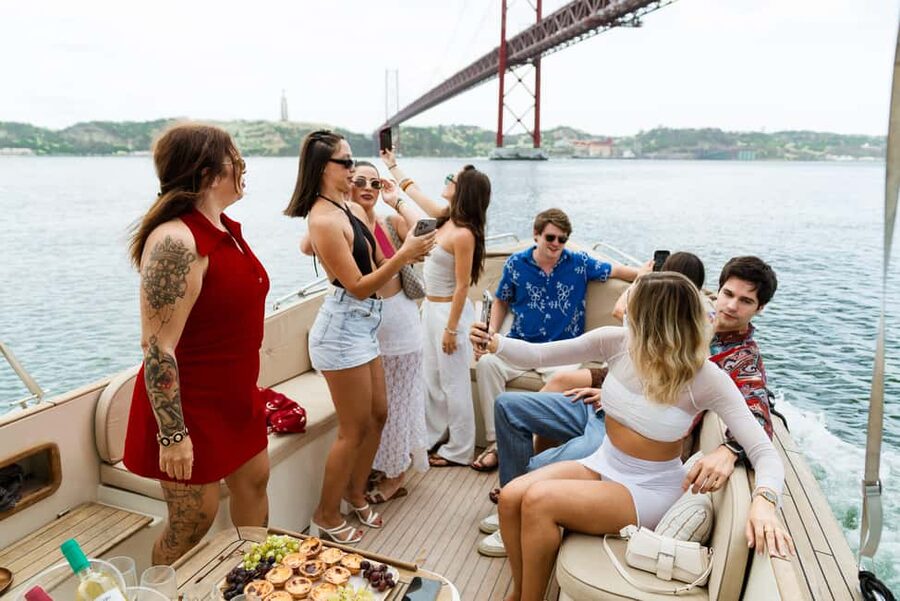 Lisbon: Relax in the Waves - Open Bar and Snacks at Sunset - Across to Porto Brandão, Trafaria, and Christ the King