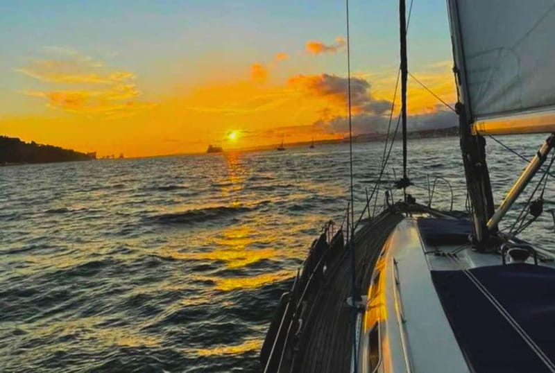 Lisbon: Sailing Boat Tour with Drinks & Pastel de Nata - Comfort on deck, inside the cabin, and in cooler weather