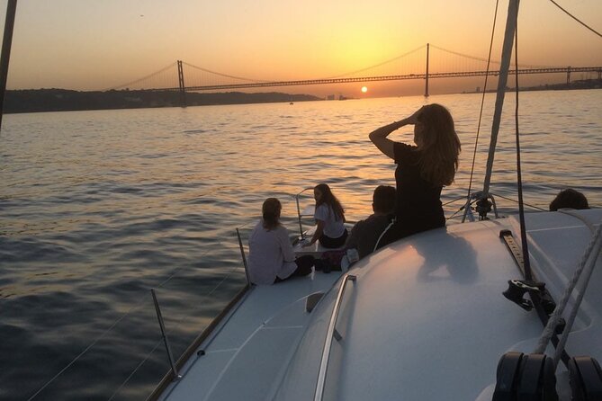 Lisbon Sailing Catamaran Public Cruise with drinks - Praça do Comércio and Alfama from the water
