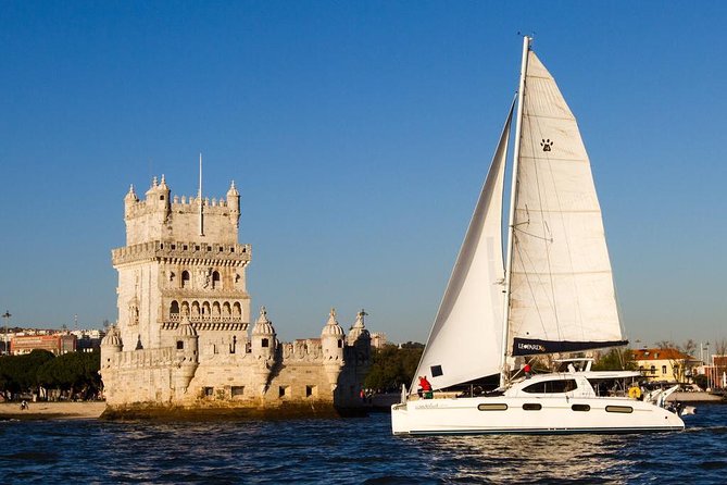 Lisbon: Sunset Cruise With Drinks on Spacious Yacht - Boarding below the 25 de Abril Bridge