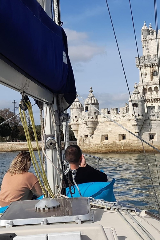 Lisbon: "Sunset" & "Day Tours" by boat, with drink and music - Sunset, vinho verde, and a calm onboard mood