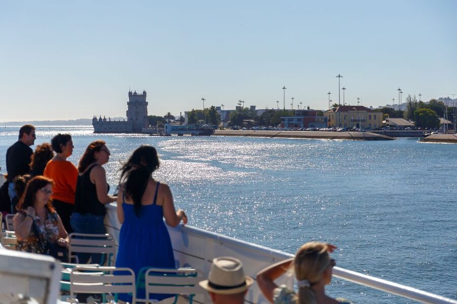 Lisbon: Tagus River Boat Tour with One Drink Included - Sundeck seats, indoor comfort, and the audio guide