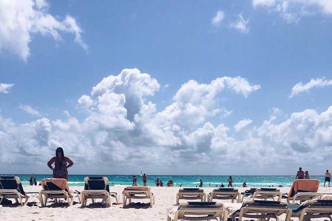 Live this unique experience. Catamaran to Isla Mujeres Tour. Open Bar included. - A full Caribbean day from Playa Langosta
