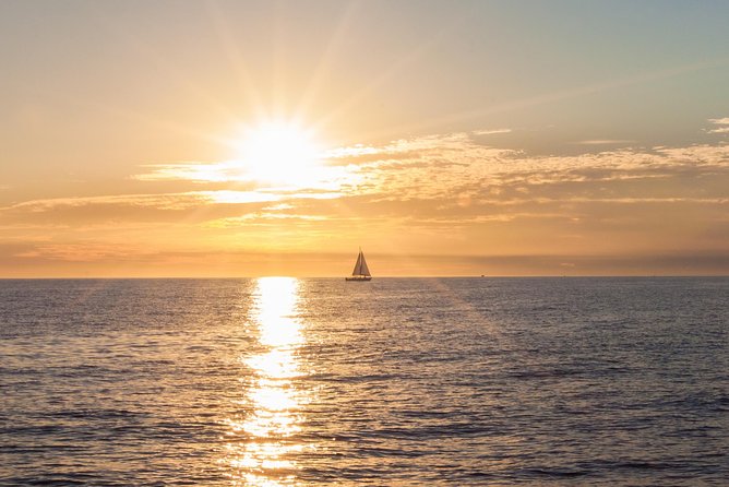 Los Cabos Luxury Sunset Sail with Light Appetizers and Open Bar - Pickup, marina details, and extra charges