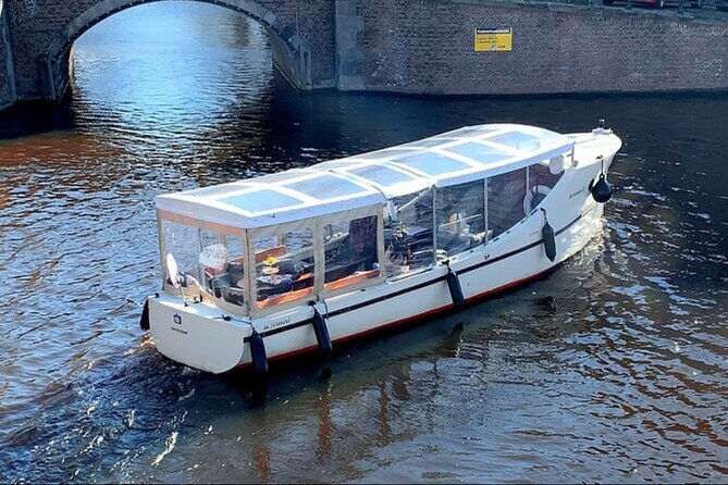 Luxury Amsterdam Canal Cruise – Unlimited Cocktails Included (1H) - Starting among Amsterdam’s oldest canals