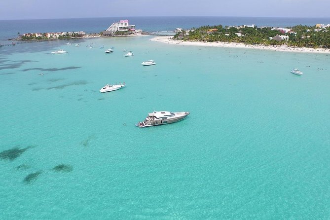 Luxury Catamaran Privilege to Isla Mujeres + Open Bar VIP - Free time in downtown Isla Mujeres