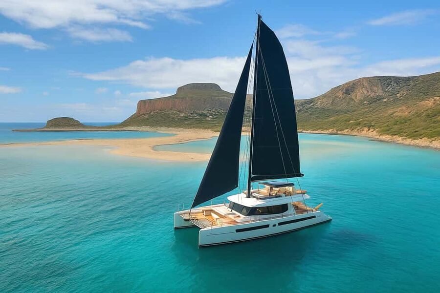 Luxury Catamaran to Balos: Sunset, Snacks, Drinks & Transfer - Leaving Kissamos with snacks and a welcome drink