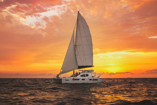 Luxury Sunset Sailing Cruise in Cancun with Light Dinner and Open Bar - Boarding the catamaran and finding your place