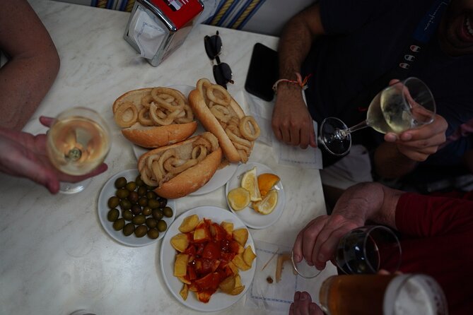 Madrid by Night: Tapas Crawl, Local Drinks & Hidden Gems - Plaza Mayor and the famous calamari sandwich