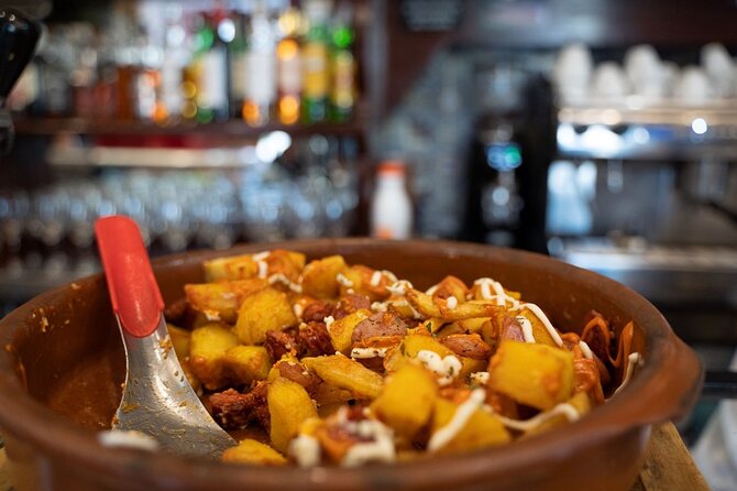 Madrid by Night: Tapas Crawl, Local Drinks & Hidden Gems - The guides are a major part of the value