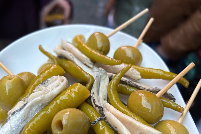 Madrid Local Tapas Tour with Private Dinner and Bottomless Wine - A Madrid evening built around food and conversation