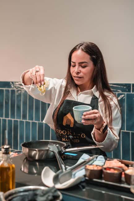 Madrid: Tapas Cooking Class with bottomless Wine Pairing - Moving from the kitchen to the old wine cellar