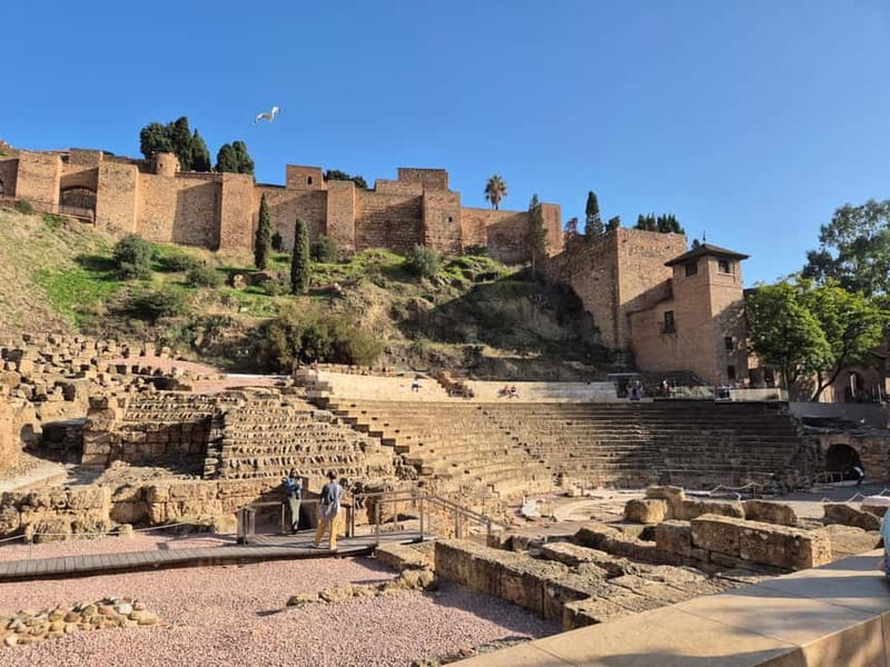 Málaga: Highlights Walking Tour with Drinks and Tapas - Roman Theater, Alcazaba, and Gibralfaro Castle