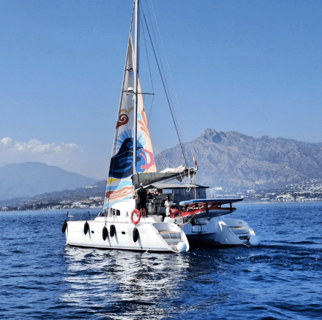 Marbella: Group Dolphin Watching Catamaran Tour with Snacks - Dolphin watching without false promises