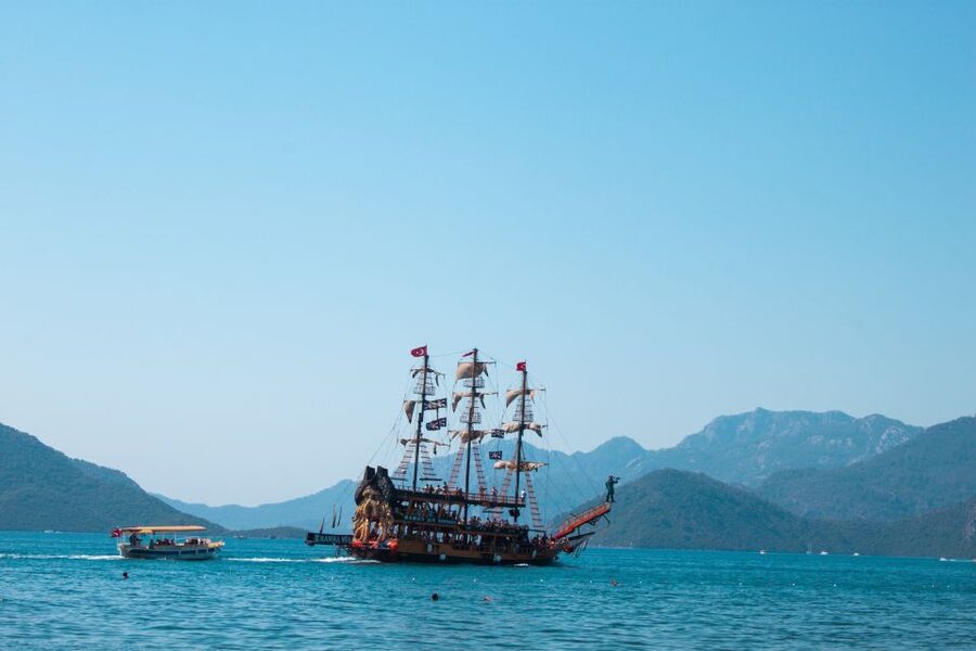 Marmaris: Pirate Boat Trip with Meal, Drinks and Transfer - Green Sea Beach and the return to Marmaris