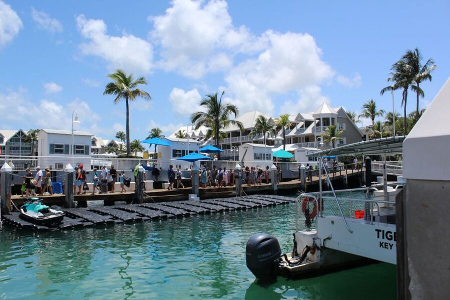 Miami: Key West Boat Tour w/ Optional Snorkeling & Open Bar - Boarding the Boat and Heading Toward the Reef