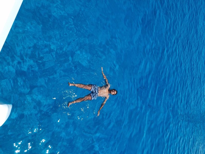 Milos: Full-Day Catamaran Cruise with Food and Open Bar - Thiorichia Beach and the old mining coast