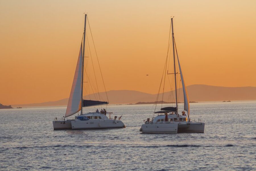 Mykonos: Catamaran Cruise with Lunch, Drinks and Transfer - Sailing, motor power, and sea conditions