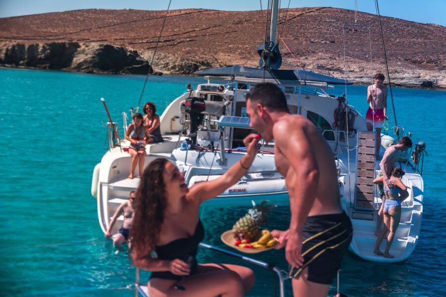 Mykonos: Catamaran Cruise with Lunch, Drinks and Transfer - The return past Mykonos Town