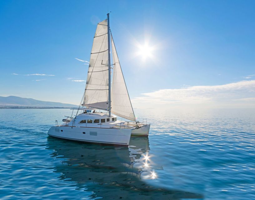 Mykonos: Private Catamaran Cruise w/ Food, Drinks & Transfer - The return past Mykonos windmills