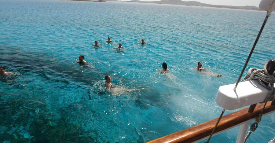 Mykonos: Sunset Party Boat Cruise with 1 Drink - The Agios Stefanos swim stop