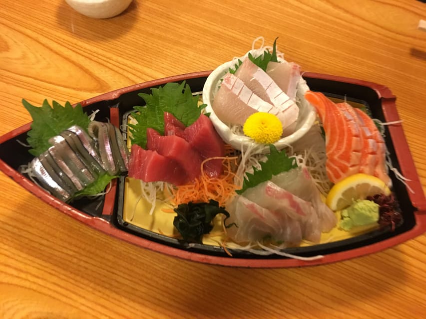 Osaka: Deep Food Tour and Bar Hopping in Namba - Finishing beside the Glico sign