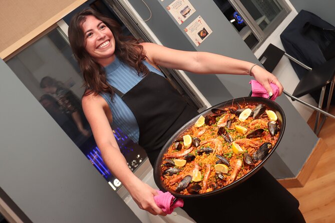 Paella Workshop with Bottomless Sangria in Central Madrid - Mixing sangria before the paella