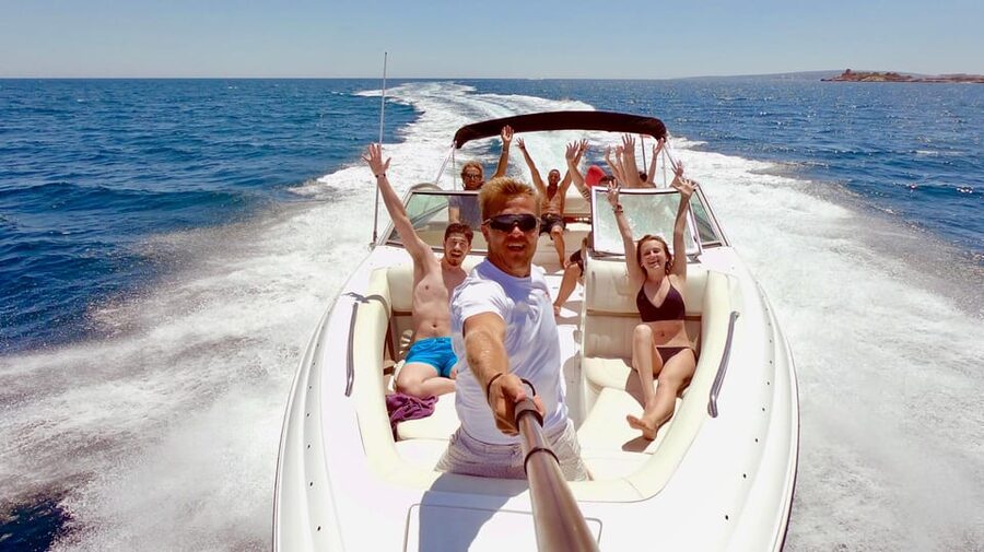 Palma de Mallorca: Private Yacht Trip with Drinks - Relaxing on deck between water stops