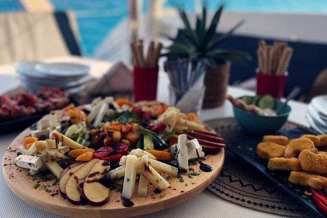 Panormo: Luxury Sunset Catamaran Cruise Sushi & Open Bar - Leaving Panormo with Prosecco and Cretan snacks