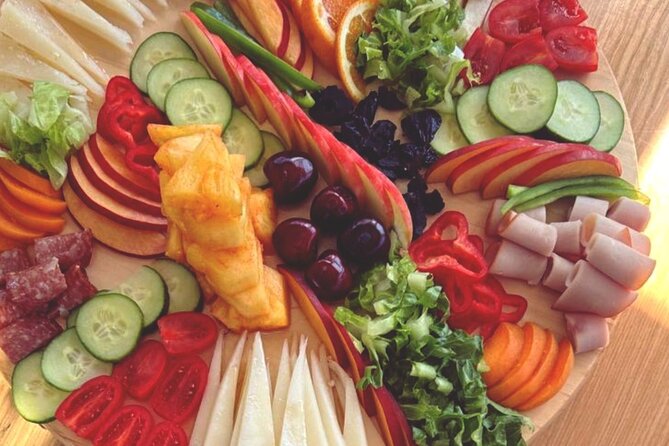 Panormo: Luxury Sunset Catamaran Cruise Sushi & Open Bar - Sushi, Greek drinks, and fresh fruit on deck