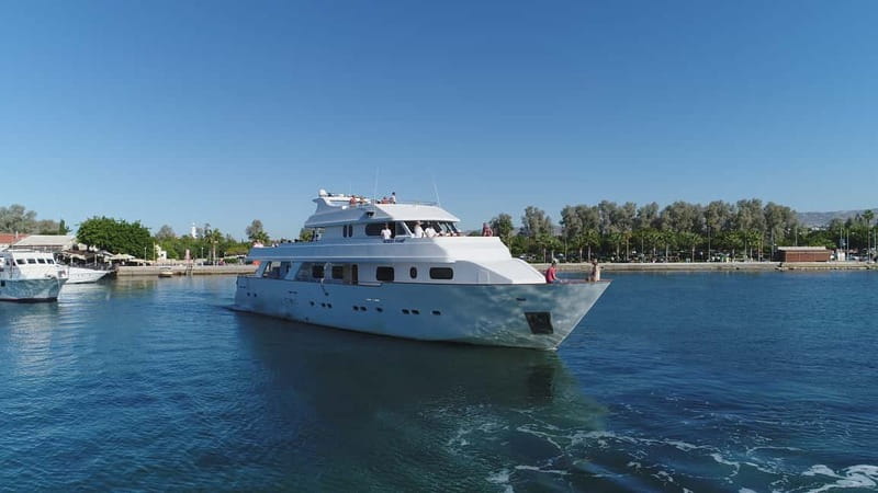 Paphos: Adults Only Cruise with Drinks, Food, Bus, Swim Stop - Boarding the Ocean Flyer from Paphos