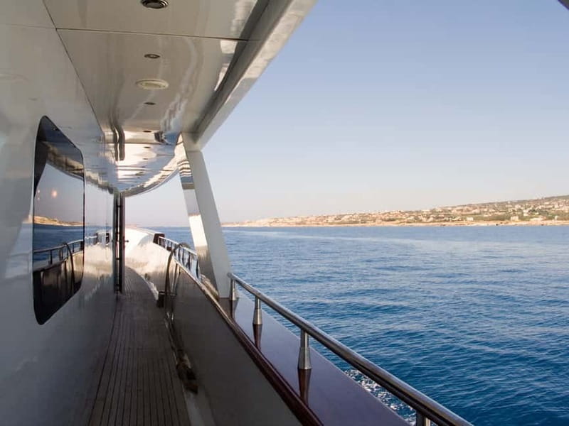 Paphos: Adults Only Cruise with Drinks, Food, Bus, Swim Stop - The first hour: coastal views from Paphos
