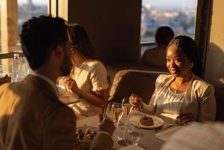 Paris: Elegant Dinner with Drinks in the Eiffel Tower - The Elevator Ride and First-Floor Setting