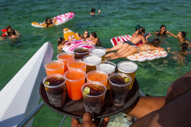 Party Boat /View Dolphins / Snorkling /Free Drinks and Transportation - Open bar value, snacks, and what $57 really buys