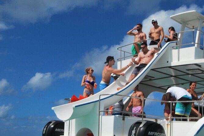 Party Boat /View Dolphins / Snorkling /Free Drinks and Transportation - Dolphin viewing is distant and limited