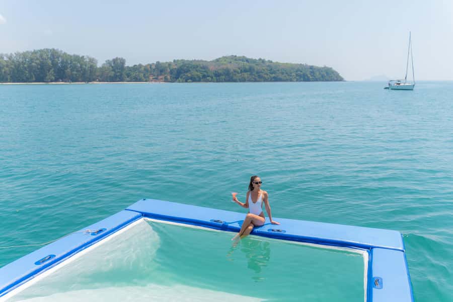 Phuket: Phang Nga Bay Lunch and Dinner Sunset Party Cruise - Phang Nga Bay scenery between the stops