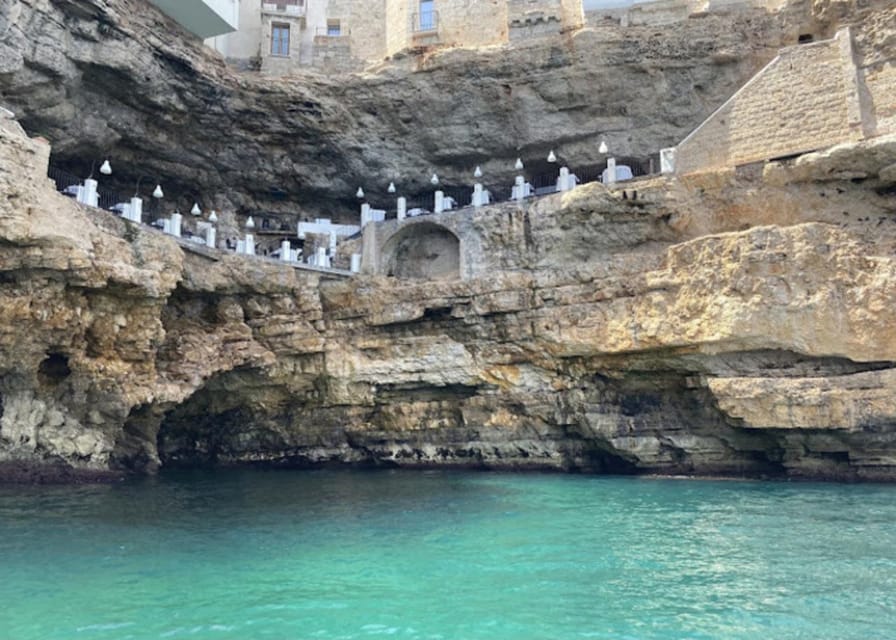Polignano's coast and caves: a boat tour with drinks, swimming, music, and fun - Why seeing Polignano from the water matters