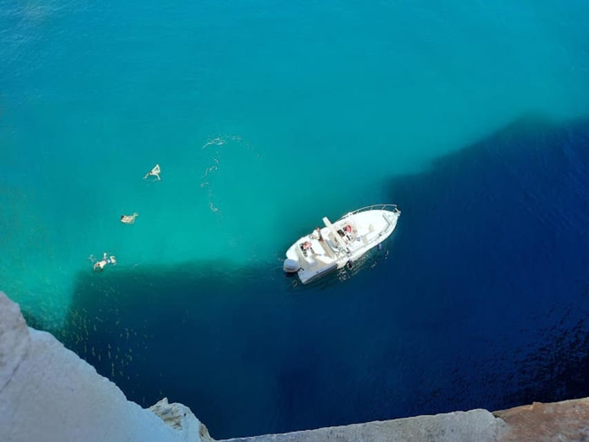 Polignano's coast and caves: a boat tour with drinks, swimming, music, and fun - Grotta Palazzese and the cliffside town