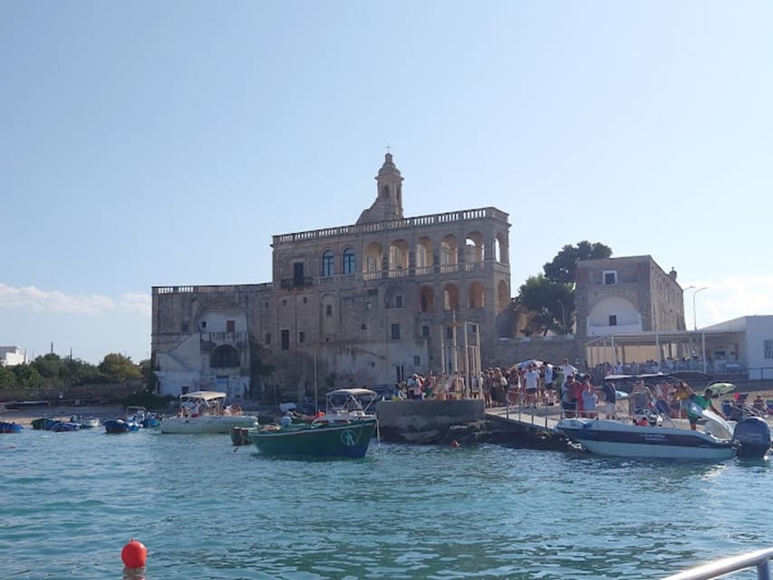 Polignano's coast and caves: a boat tour with drinks, swimming, music, and fun - The swim, snorkeling, drinks, and snacks