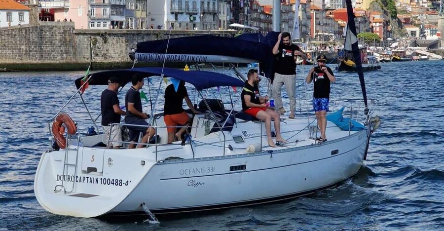 Porto: Exclusive Party aboard a charming sailboat with drink - The Luiz I Bridge and Porto’s Ribeira