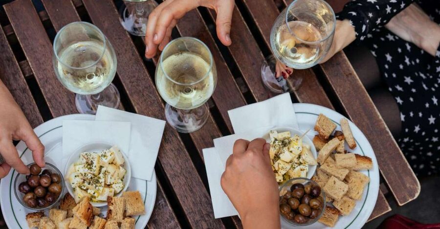 Porto: Private Evening Tour with Drinks & Bites - Starting the evening around Clérigos